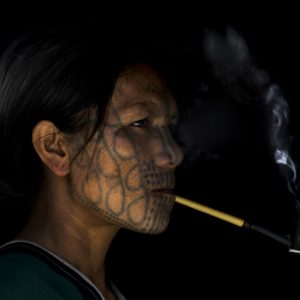 Burma - Tattooed woman, Chin Mountains.